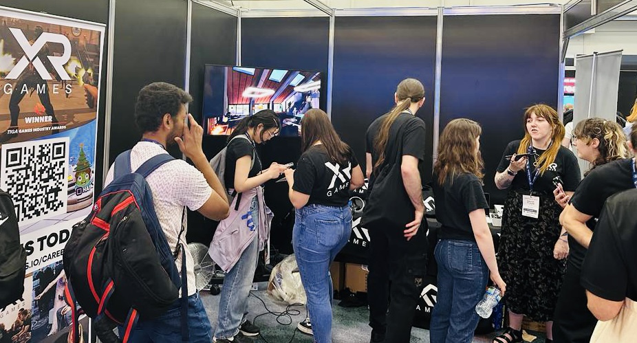 XR Games stand at the expo packed with people